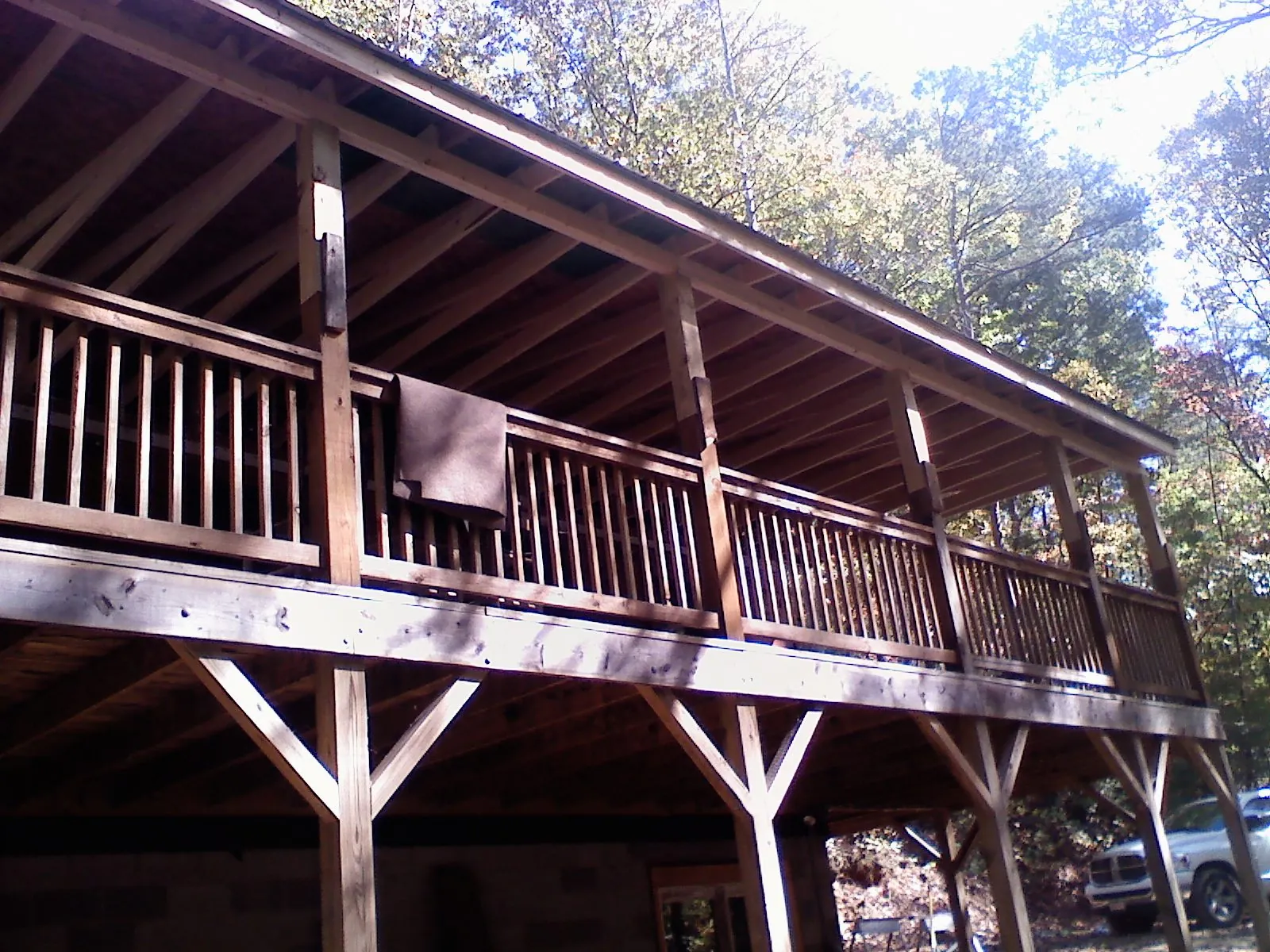 Timber framing under a new elevated porch and deck — Roof Leak Repair in Sebago by Roofing Brothers